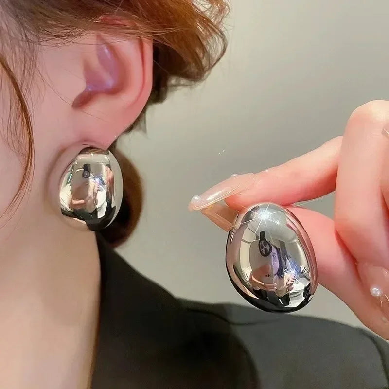 Exaggerated Water Drop Oval Glossy Metal Earrings – Gold/Silver, Trendy Studs for Women & Girls.